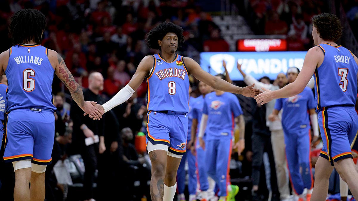 OKC Thunder high fiving