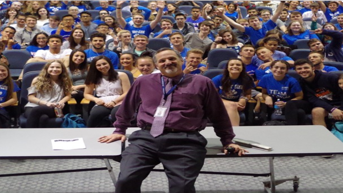 school superintendent with students