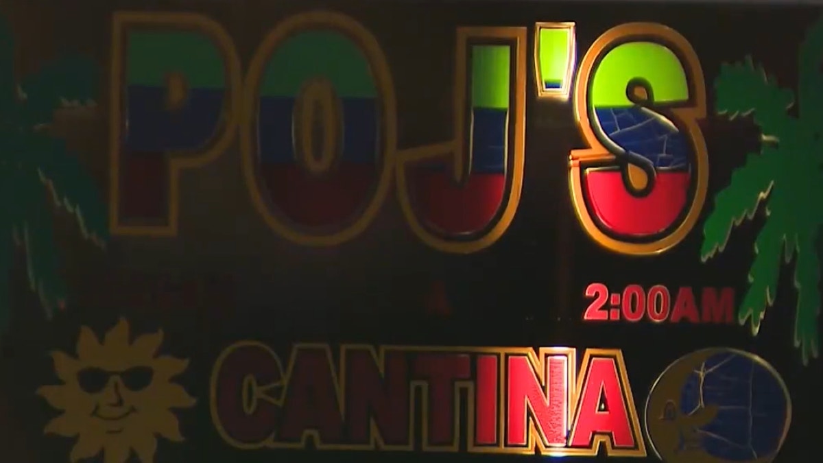 Close-up of cantina sign