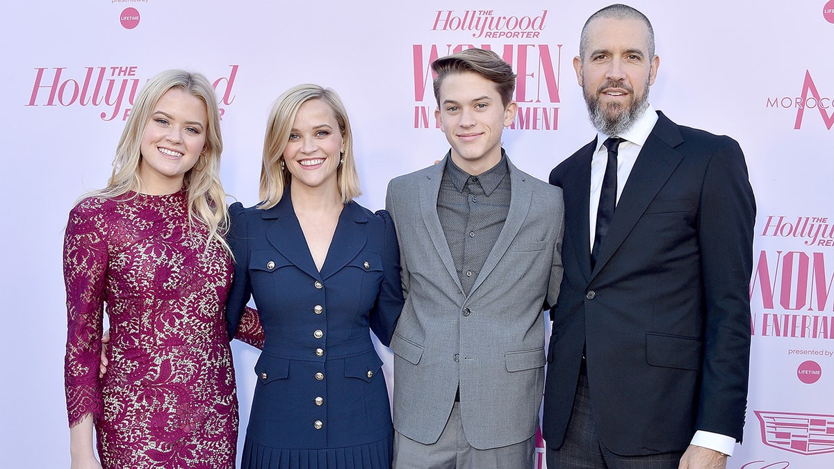 Reese Witherspoon poses with her children Ava and Deacon on red carpet with husband Jim Toth