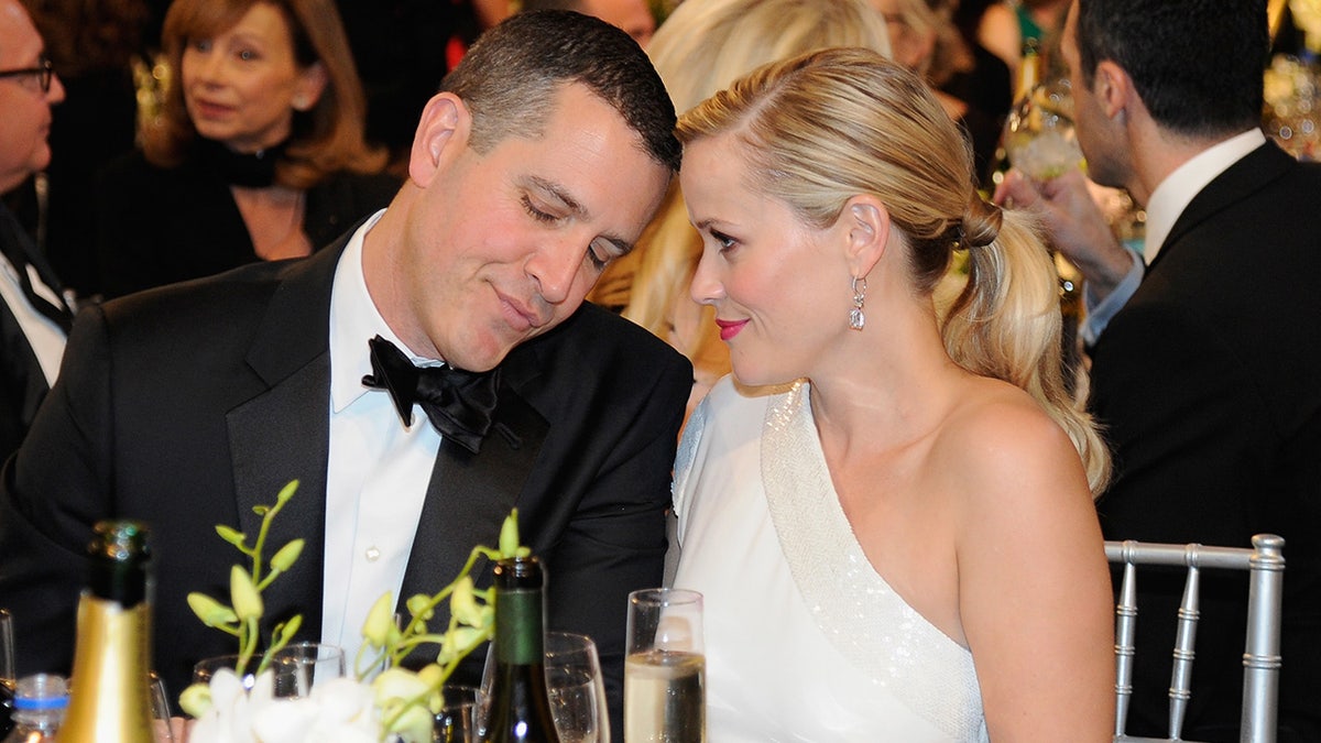 Reese Witherspoon and Jim Toth share a tender moment at SAG Awards