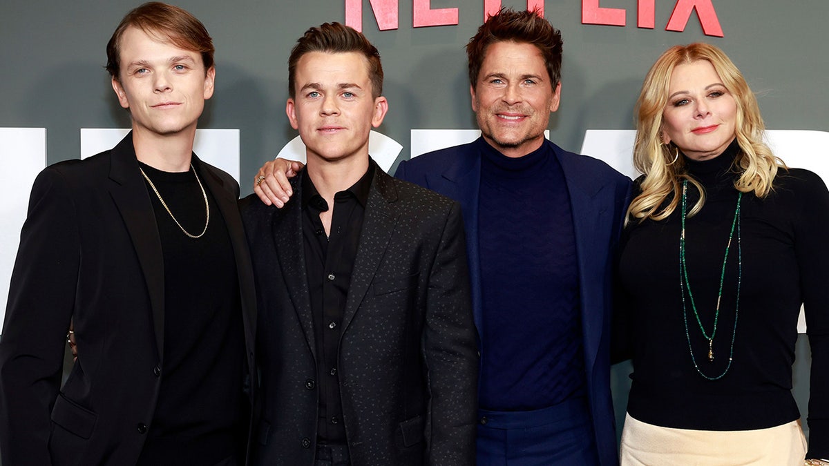 Rob Lowe's family smiles on red carpet at Netflix premiere