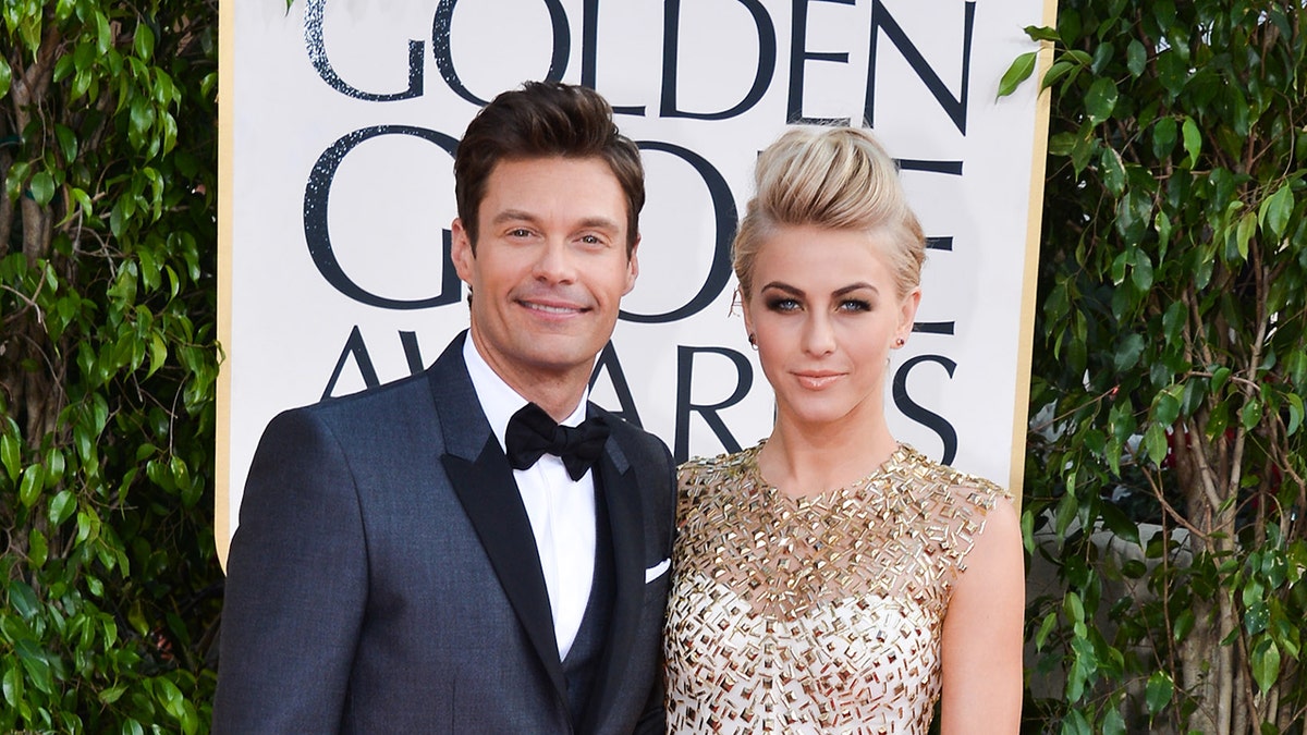 Julianne Hough and Ryan Seacrest posing together