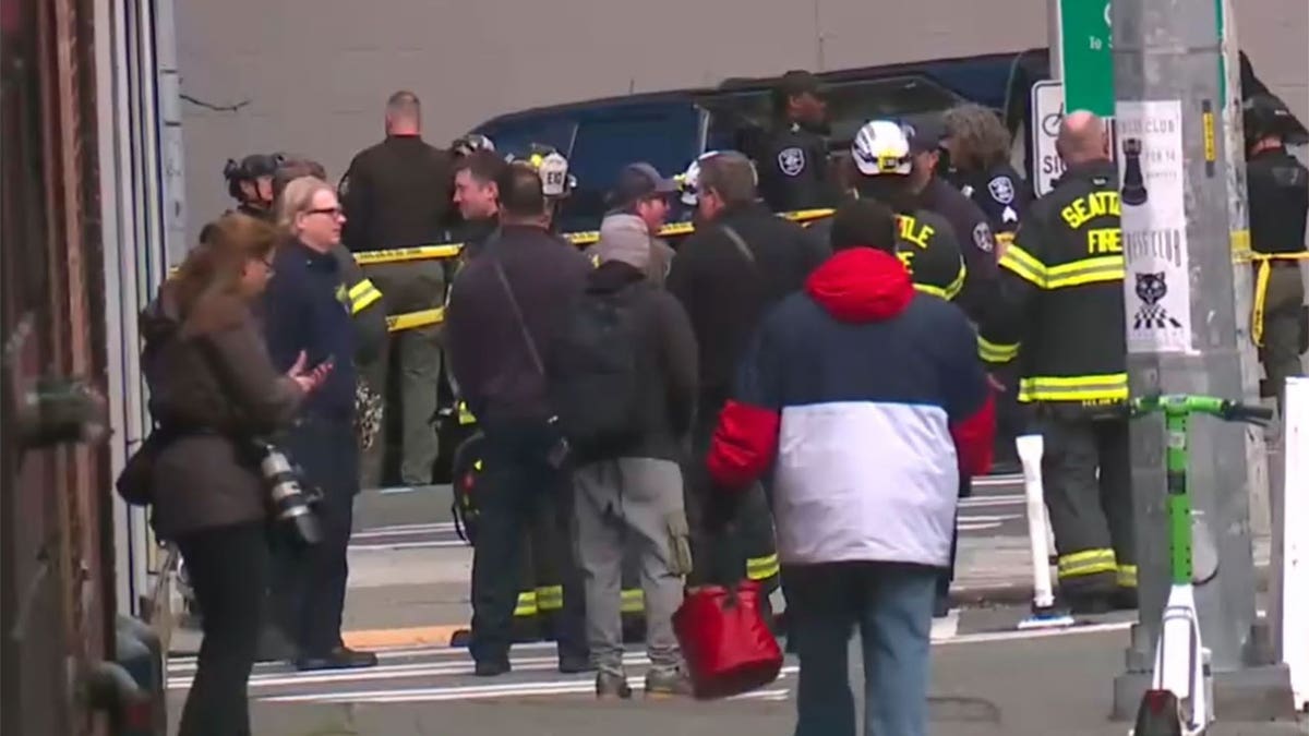 People gather around scene of reported explosion in downtown Seattle