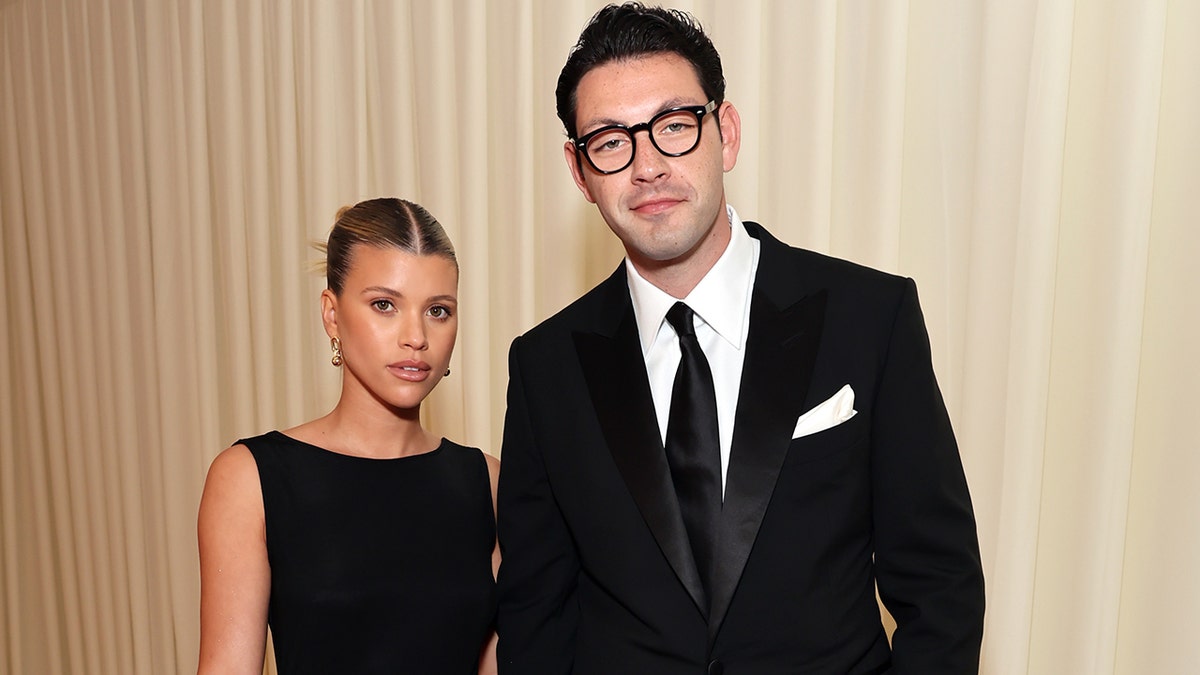 Sofia Richie wears stunning black gown for Elton John AIDS Foundation's 30th Annual Academy Awards party with Elliot Grainge