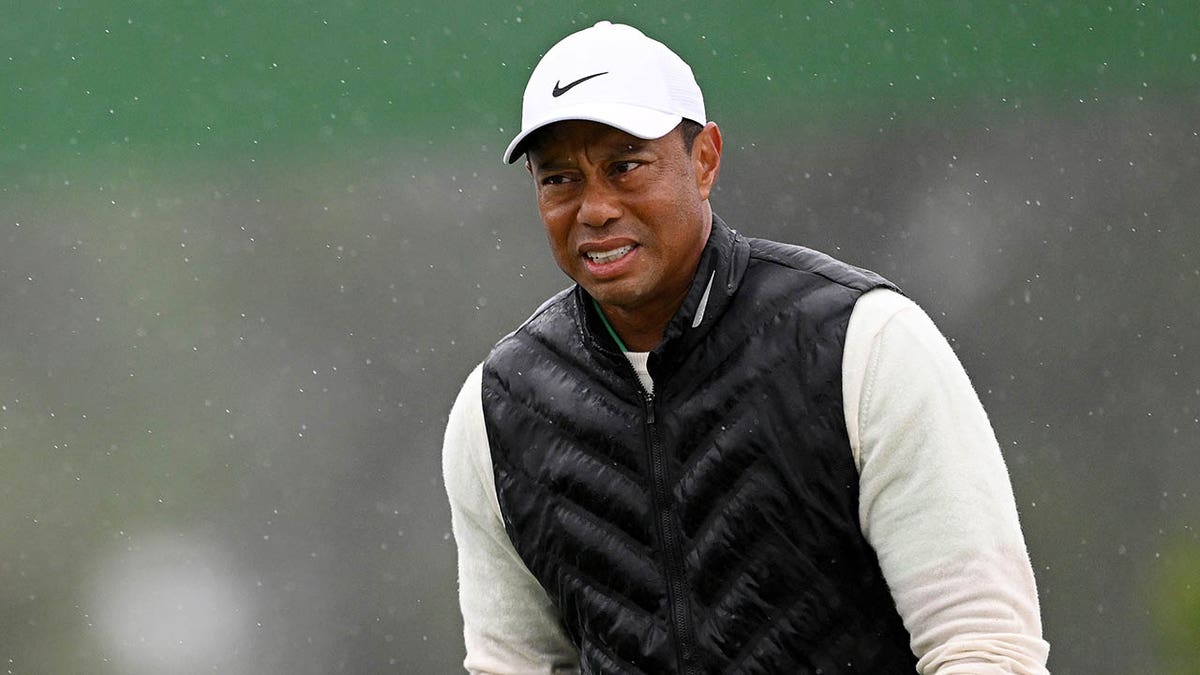 Tiger Woods grimacing