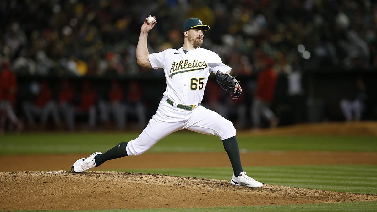 Trevor May pitching