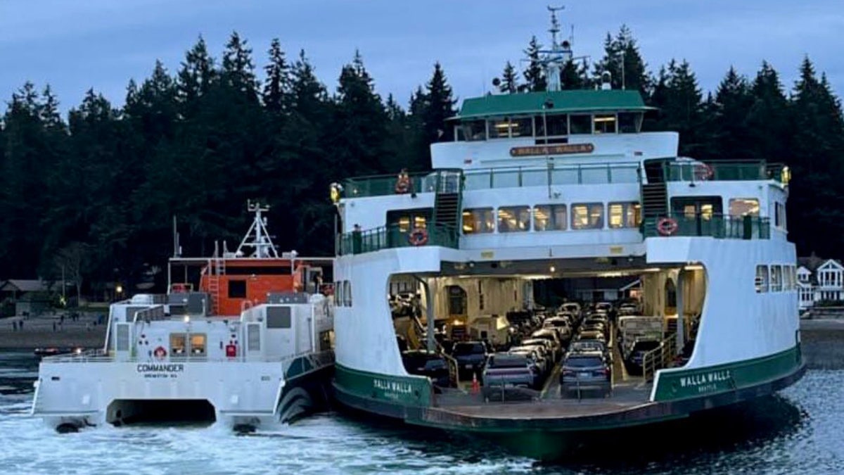 vessel next to stranded ferry