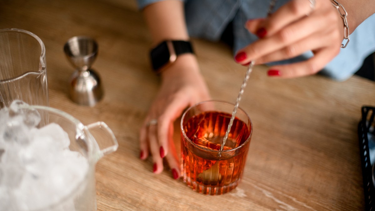 Woman drinking alcohol