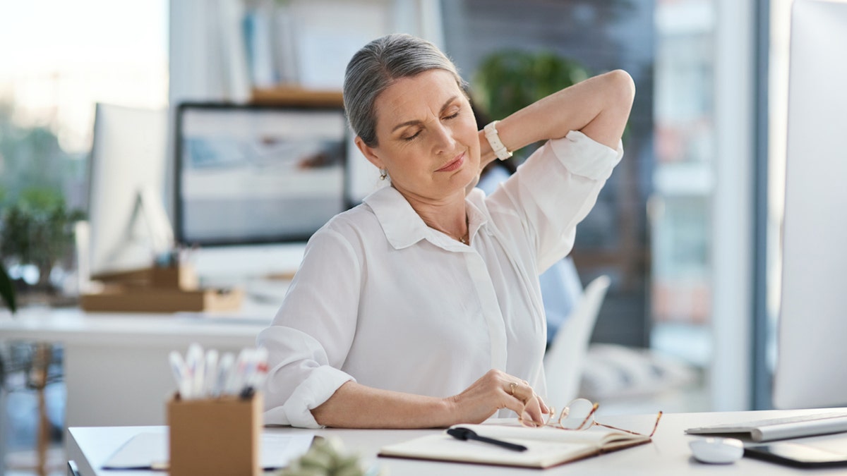 Woman with neck pain