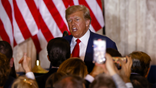 Former US President Donald Trump departs after delivering remarks at the Mar-a-Lago Club in Palm Beach, Florida, US, on Tuesday, April 4, 2023. Trump entered a not-guilty plea to 34 counts of falsifying business records in the first degree in a proceeding that took a little less than an hour.