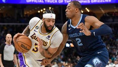 Lakers' Anthony Davis appears to injure arm in Game 1 vs Grizzlies, comes back to play crucial role in win