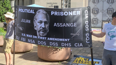 Supporters of Julian Assange rally at Justice Dept. on 4-year anniversary of detainment