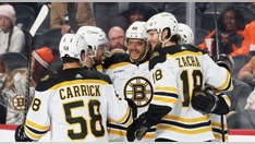 Bruins set new NHL record after beating Flyers for 63rd win of season