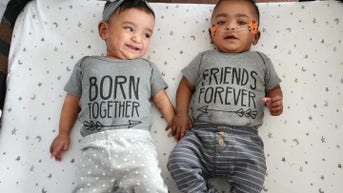 Record-breaking twins born four months early defy odds