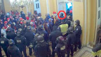 Navy sailor who was stationed on Virginia aircraft carrier charged with storming the Capitol