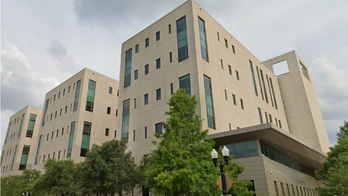 Justice Department charges 4 Americans and 3 Russians for attempting to influence elections