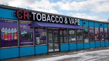 Kansas Gov. Laura Kelly signs bill raising legal age to buy tobacco to 21