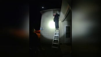Indiana police bodycam captures harrowing moment officers saved baby, family from burning house