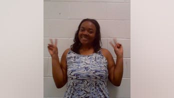 New Hampshire wrong-way driver flashes smile, peace signs in mugshot after police deflate tires on interstate