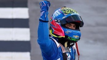 Kyle Larson holds off Joey Logano at Martinsville