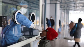 India asks other countries to increase COVID testing as cases climb