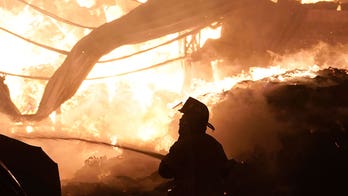 200 firefighters in Mexico City battle huge blaze at wholesale market
