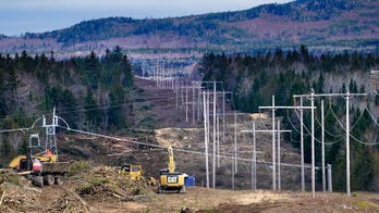 Massachusetts budget approval lets utilities raise rates to compensate for Canadian hydropower corridor costs