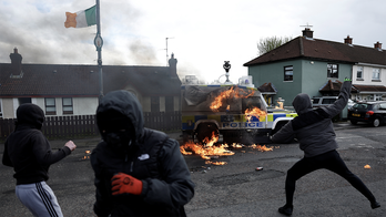 Northern Ireland dissidents throw molotov cocktails at police vehicles one day before Biden's visit