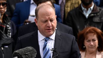 Colorado governor signs gun control bills after LGBTQ nightclub massacre