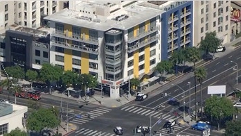 California suspect barricaded in West Hollywood luxury apartment, 1 woman shot