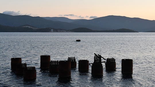 Croatia clears beaches of mysterious oil clumps ahead of tourist season