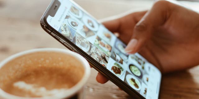 Phone with user browsing pictures