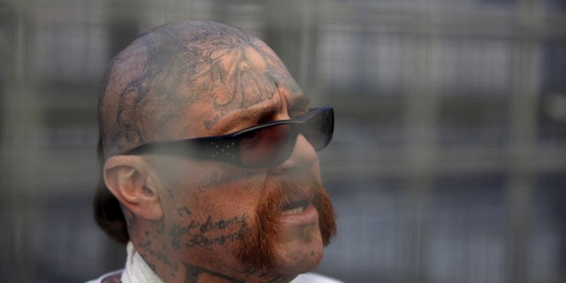 Robert Galvan, who is on death row for murder, speaks to members of the media at the Adjustment Center yard during a media tour of California's death row at San Quentin State Prison in San Quentin, California, on Dec. 29, 2015. Galvan, who was sentenced to death in 2000, would not be eligible for resentencing under the proposed new law, which would benefit prisoners sentenced prior to June 5, 1990.