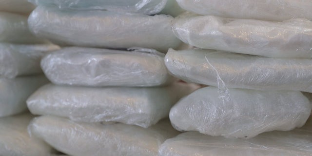 Fentanyl in bags stacked up on a table