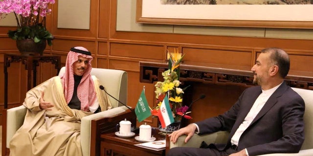Iranian Foreign Minister Hossein Amir-Abdollahian, right, meets with Saudi Arabia's Foreign Minister Prince Faisal bin Farhan Al Saud in Beijing April 6, 2023.