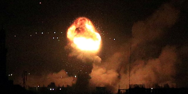 Smoke and flames rise during Israeli airstrikes in Gaza, April 6, 2023.