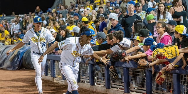 The players thank all the fans after each game — something team owner Jesse Cole said is special to the team. 