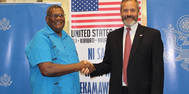 Former U.S. Ambassador to Fiji, Kiribati, Nauru, Tonga, and Tuvalu Joseph Cella (right) is pictured in September 2020.