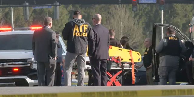An ATF agent is seen Monday. April 10 in Louisville, Kentucky.