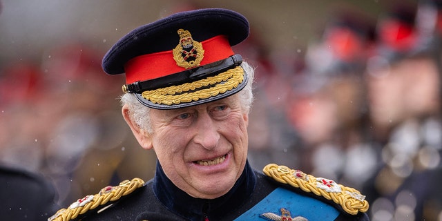 King Charles III inspects graduating officer cadets during the 200th Sovereigns Parade at the Royal Military Academy, Sandhurst, southwest of London on April 14, 2023. According to royal experts, the monarch is pleased that both of his sons will be present for his big day.