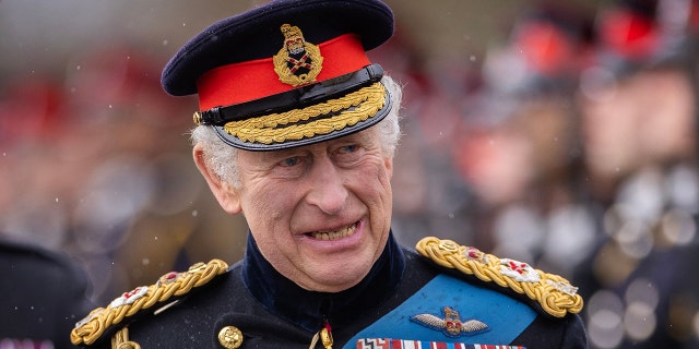 King Charles III inspects graduating officer cadets during the 200th Sovereigns Parade at the Royal Military Academy, Sandhurst, southwest of London on April 14, 2023. According to royal experts, the monarch is pleased that both of his sons will be present for his big day.