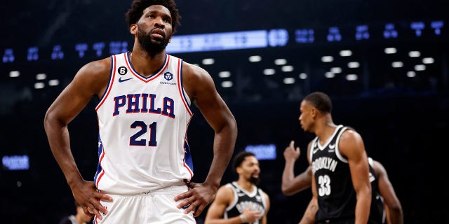 Joel Embiid reacts during a playoff game