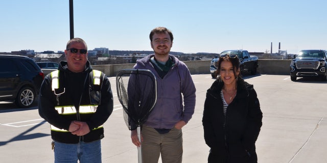Aimal rescuers with the Wildside Rehabilitation and Education Center helped guide the Cooper's hawk out from the parking garage and into freedom.