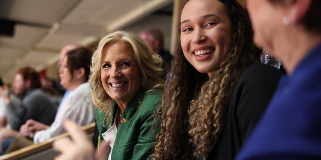 First Lady Jill Biden talks with guests while watching the 2023 NCAA Women's Basketball Tournament National Championship at American Airlines Center on April 2, 2023 in Dallas, Texas.