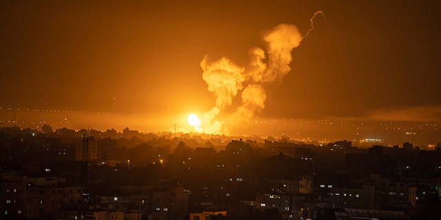 An Israeli airstrike in central Gaza Strip on Friday, April 7, 2023, caused fire and smoke to rise. 