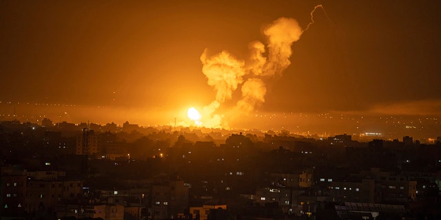 An Israeli airstrike in central Gaza Strip on Friday, April 7, 2023, caused fire and smoke to rise.