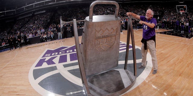 A Kings fan rings the cowbell