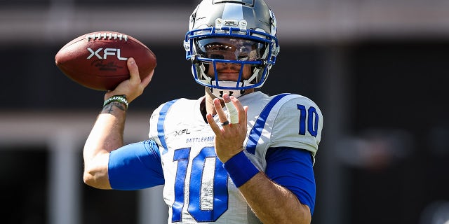 AJ McCarron warms up