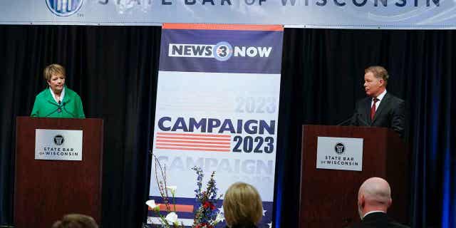 Wisconsin Supreme Court candidates Republican-backed Dan Kelly and Democratic-supported Janet Protasiewicz participate in a debate on March 21, 2023, in Madison, Wisconsin. The winner of the contest between Kelly and Protasiewicz will determine majority control of the court headed into the 2024 presidential election.